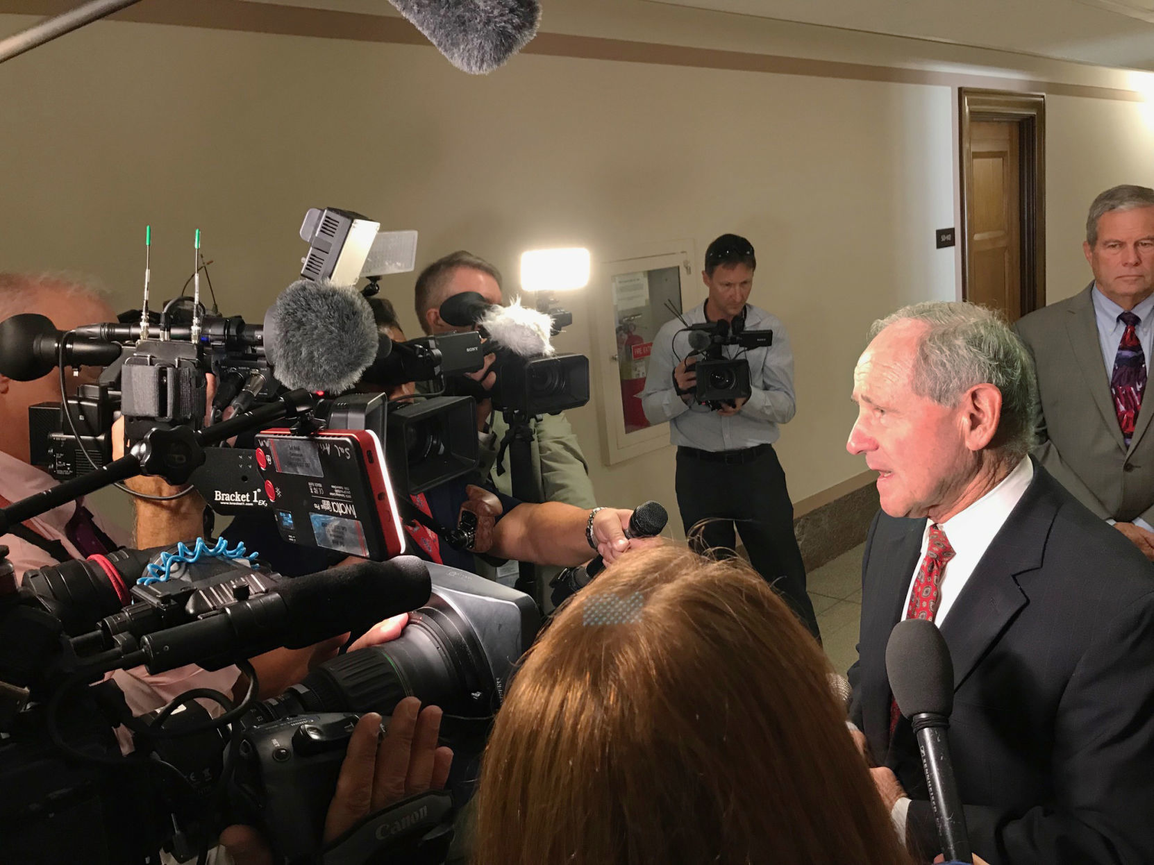 Jim Risch DC phalanx of reporters